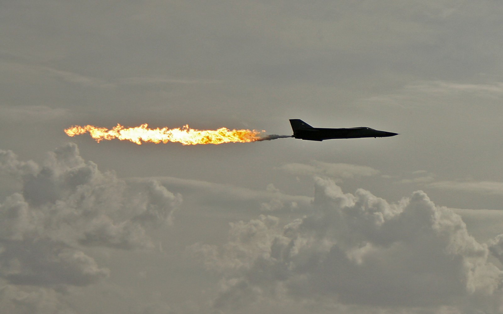 From this image, it looks like the aircraft is spraying COPIOUS amounts of fuel into the exhaust!